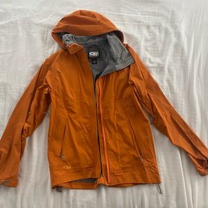 Outdoor research rain coat, orange, small. worn once or twice